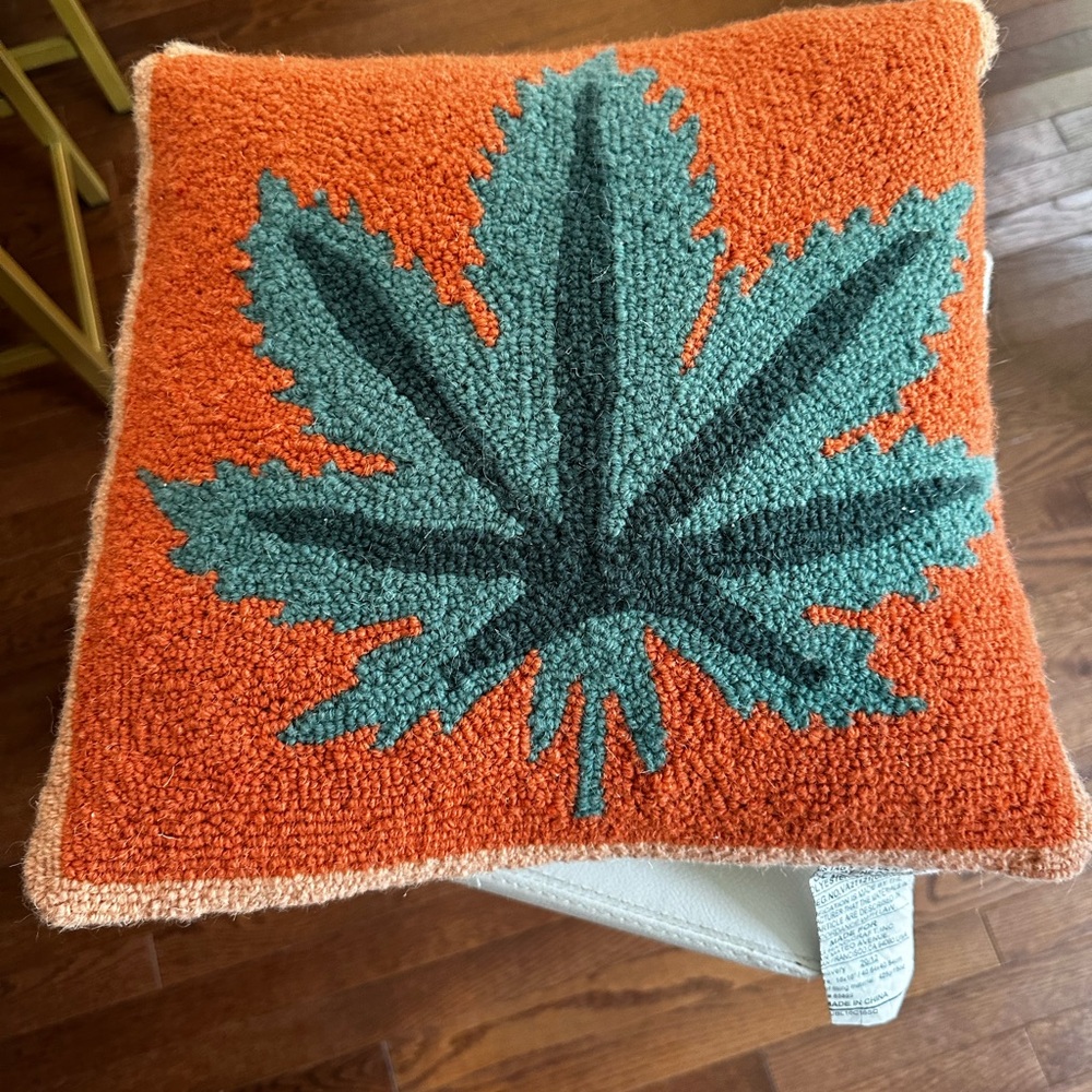 New Marajuana leaf, crocheted pillow cover w/pillow insert. Urban Outfitters.
